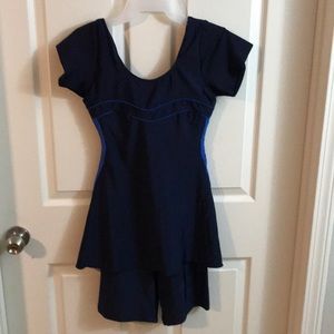 Navy blue swim suit with shots attached one piece